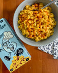 GrownAs*Foods, The plant-based mac and cheese prepare with truffle hound hot sauce.